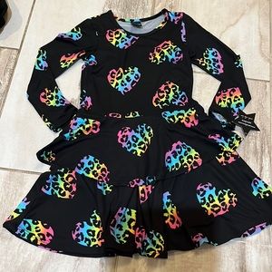 Pixie Lane girls long sleeve dress. New with tags. Non smoking. No pets.